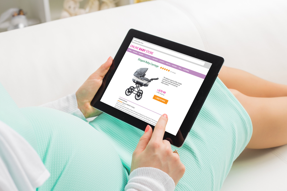 Pregnant Woman Shopping Online on Baby Store on Tablet